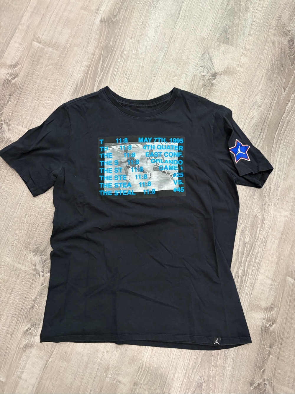 Jordan Black Short-Sleeve Tee with Blue Graphic and Star Patch
